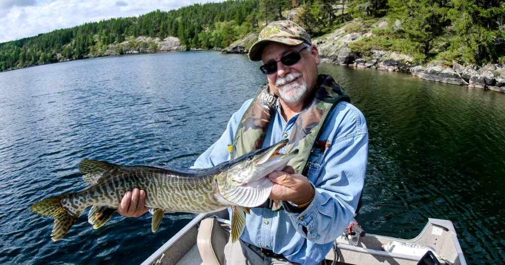 OOD big game columnist, Bruce Ranta releases a young tiger muskie.